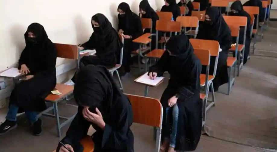 Taliban use water cannon on Afghan women