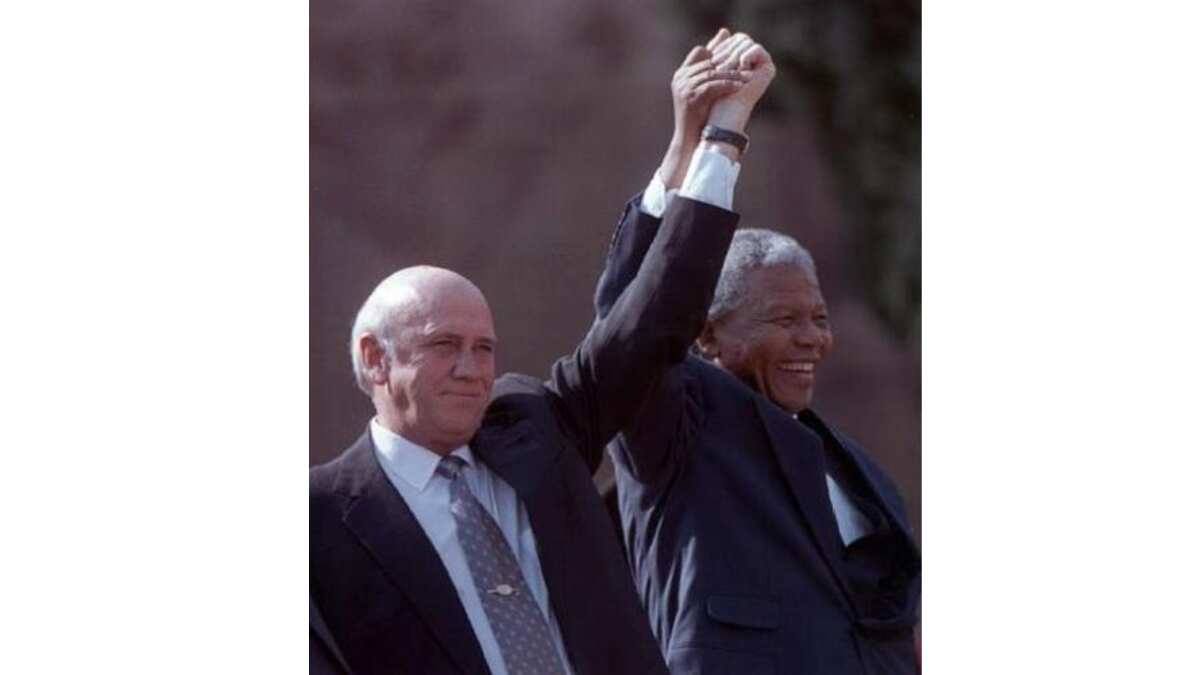 South African's President Nelson Mandela (right) with Deputy President and his reformist predecessor F.W. de Klerk in Pretoria on May 10, 1994 | Reuters