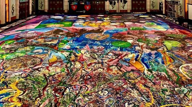 view shows the giant canvas painted by British artist Sacha Jafri, who partnered with UNICEF and UNESCO looking to raise up $30 million from selling the painting and donating them to children