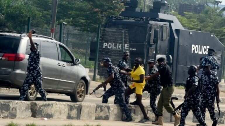 Nigerian police detaining protestors