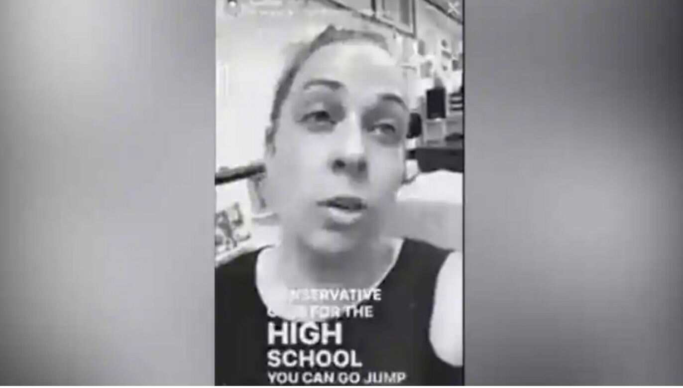 A teacher in California told students belonging to a conservative club to "jump off a bridge" after they waved an anti-Biden flag at a Veterans Day event.