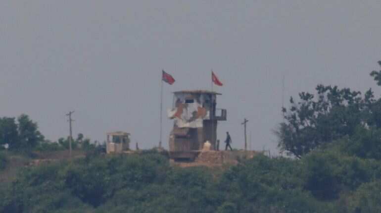 A North Korean soldier is seen beside his guard post inside North Korean territory in this picture taken near the demilitarized zone separating the two Koreas in Paju, South Korea, June 16, 2020
