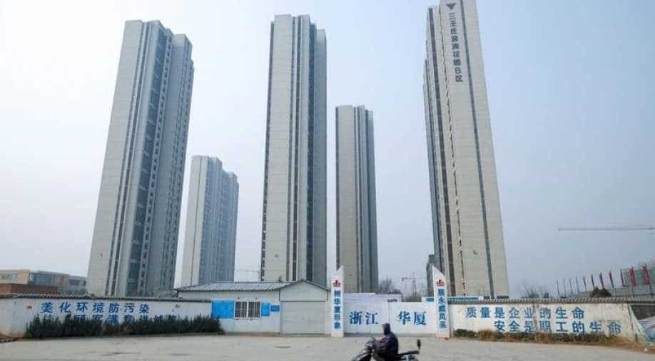 China’s economy slows again in August