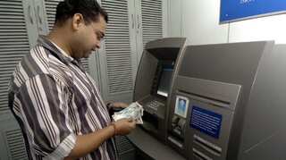 India's central bank meets officials after debit card security breach