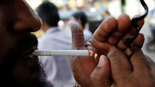 India's tobacco industry, government face off ahead of WHO conference