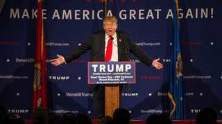 Trump rushed off stage, returns to finish speech