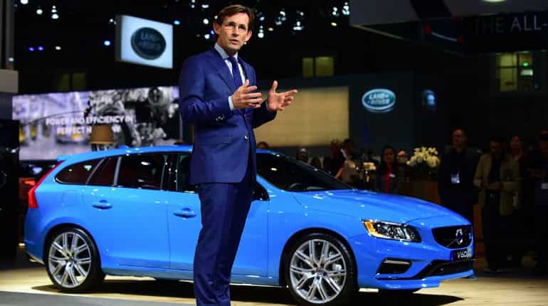 Lex Kerssemakers, president and CEO of Volvo Car USA, speaks in front of the new Volvo V60 at the Los Angeles Auto Show.