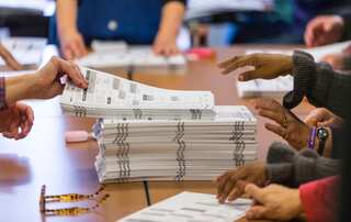 US: Donald Trump's lawyers and supporters try to block vote recounts in three states
