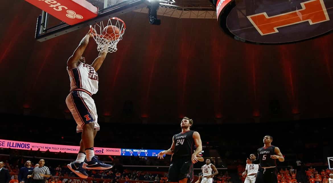 Malcolm Hill of the Illinois Fighting Illini goes up for a dunk against the IUPUI Jaguars at State Farm