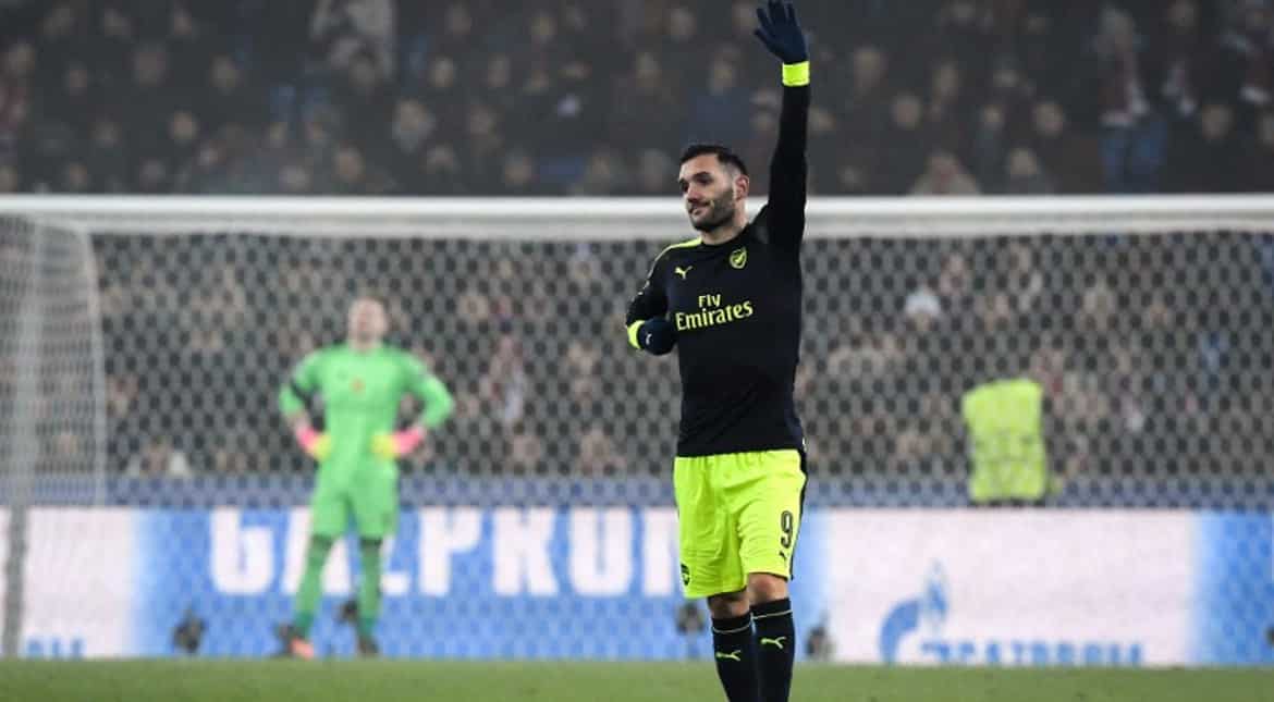 Lucas Perez scored a hat-trick for Arsenal as they beat Basel 4-1 to top Champions League group A.