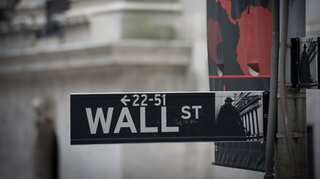 Dow winning streak ends as Fed hikes interest rates