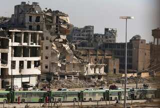 Fatal firing blows holes into fragile Aleppo evacuation deal