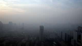 Under pollution alert, 1200 factories to shut or cut output in Beijing