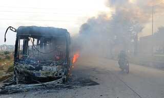 Buses burned, attacked en route to evacuate Syrian villages