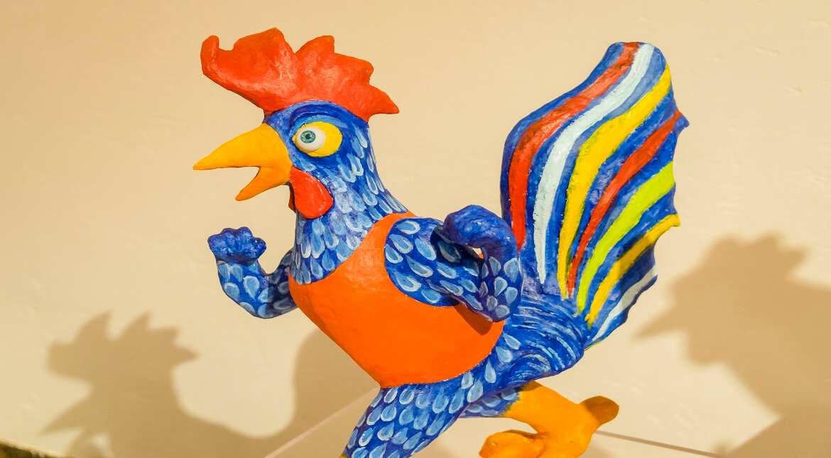 A painted rooster sculpture is on display at an art exhibition of Xuhui District in Shanghai, China.