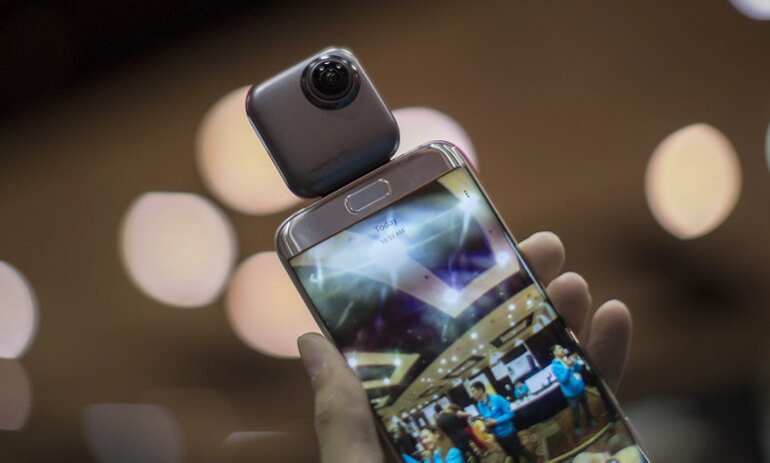 A Wink PTU 360-degree spherical camera is shown with an Android phone.