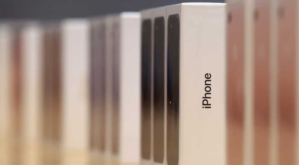 Apple cuts CEO's pay as iPhone sales drop first time