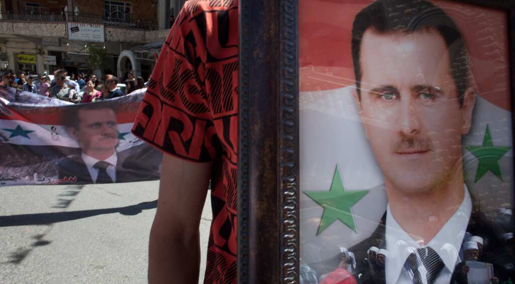 Syria's President Assad says is ready to negotiate 'everything' in future peace talks with rebels