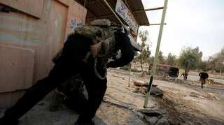 Iraqi forces fight IS at Mosul University, close to capturing areas along Tigris