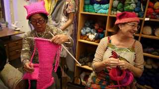 Women knit pink 'pussyhats' for rally after Trump inauguration