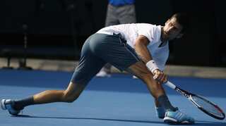 Defending champion Djokovic knocked out of Australian Open