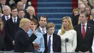 Donald Trump proclaims start of new era under grey skies