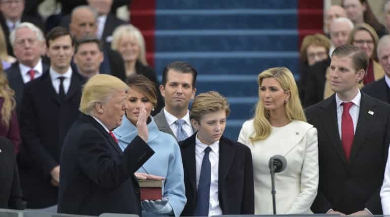 Donald Trump proclaims start of new era under grey skies