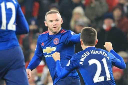 Rooney scores club record goal to help Man United pinch point at Stoke
