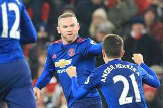 Rooney scores club record goal to help Man United pinch point at Stoke