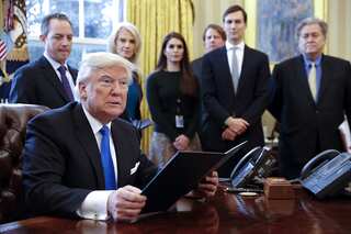 Donald Trump signs order to build wall along Mexico border