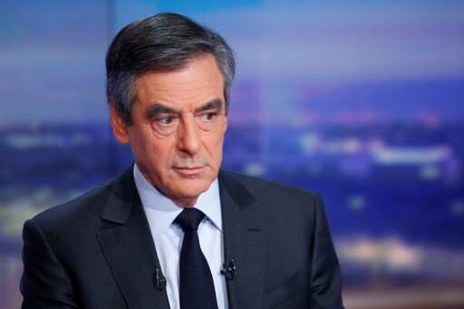 Under-attack French candidate rebuffs wife's fake job claims Under-attack French candidate rebuffs wife's fake job claims