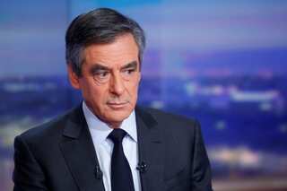 Under-attack French candidate rebuffs wife's fake job claims