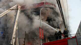 China: At least 18 killed in massage parlour fire