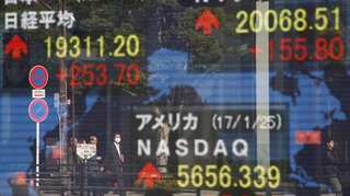 Tokyo's Nikkei closes above 30,000, first time since 1990