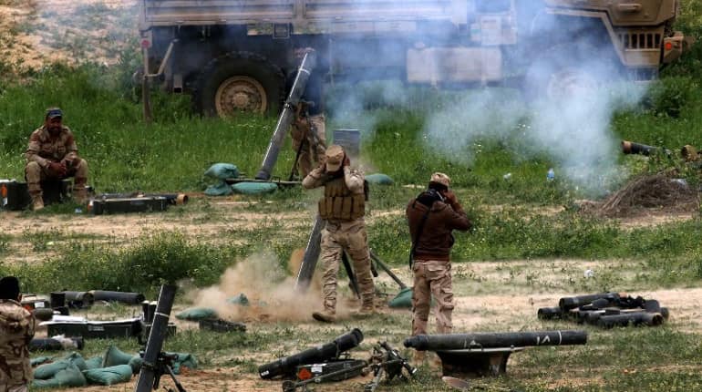Seven killed in violent protests in Baghdad, rockets hit Green Zone