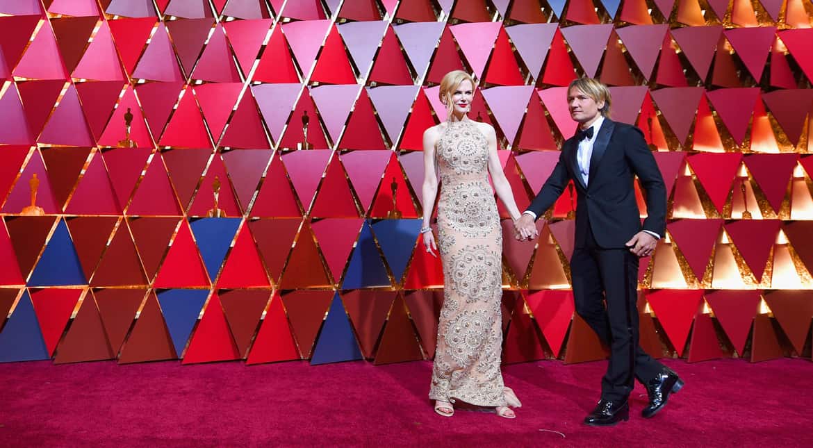 Best Supporting Actress nominee Nicole Kidman was stunning in embellished beige as she walked the red carpet with her husband Keith Urban.