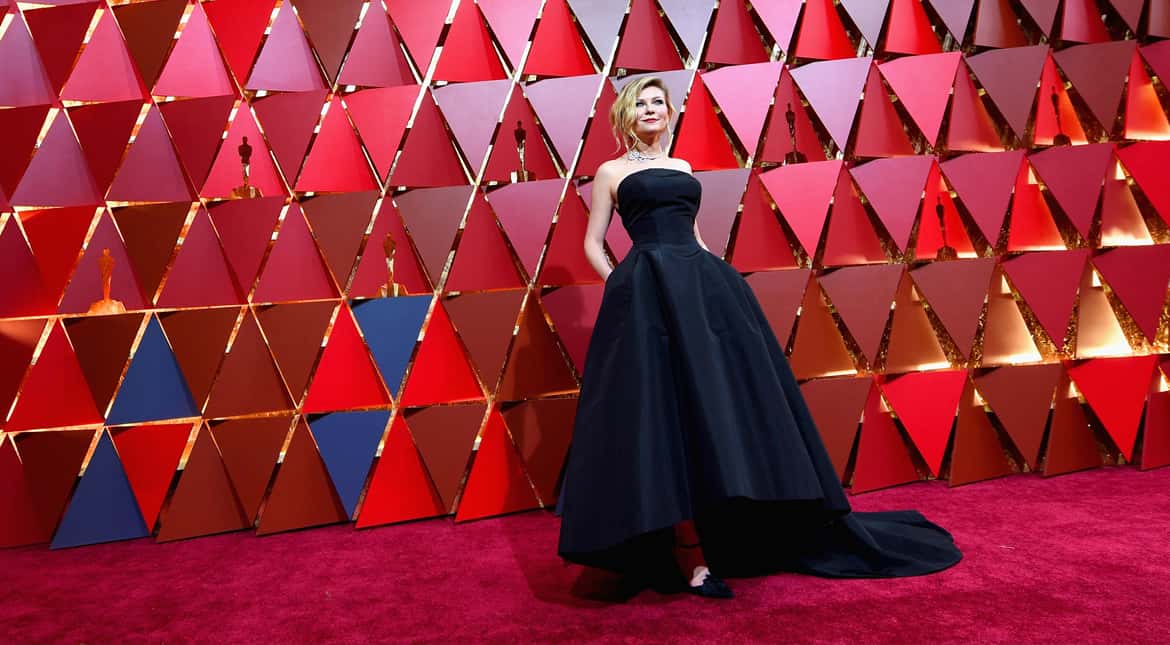 'Hidden Figures' actress Kirsten Dunst wore a figure-hugging black Christian Dior gown.