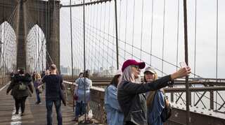 Uncertainty over new travel ban order slowing US travel bookings: Report