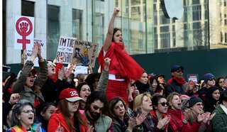 International Women's Day 2017: Thousands take part in anti-Trump protests