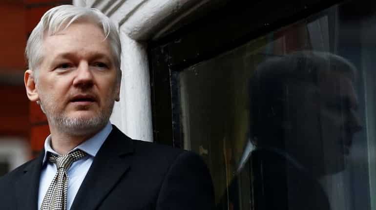 Assange accuses CIA of 'devastating incompetence' over leaks, says has more information on hacking operation