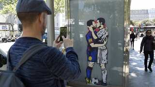 Messi, Ronaldo kissing graffiti causes stir in Barcelona