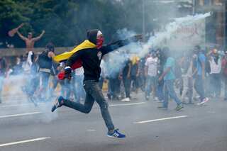 Death toll spirals as Venezuela protests rumble on