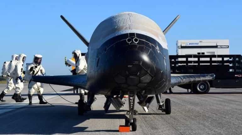 Unmanned US Air Force space plane lands after secret mission