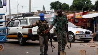 Gunfire rocks Ivory Coast cities as mutiny gathers pace