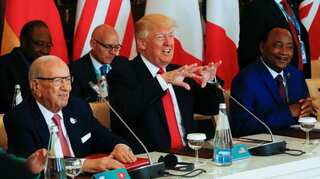 G7 leaders end summit split on climate change, more united on trade