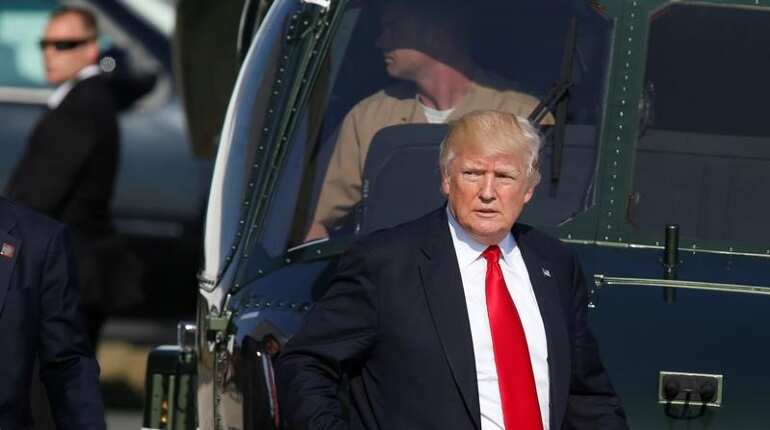 Trump blasts Russia probe, urges testimony from former adviser Page