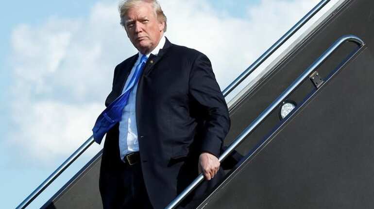 Will Trump visit UK? May, White House deny Guardian report, say trip still on