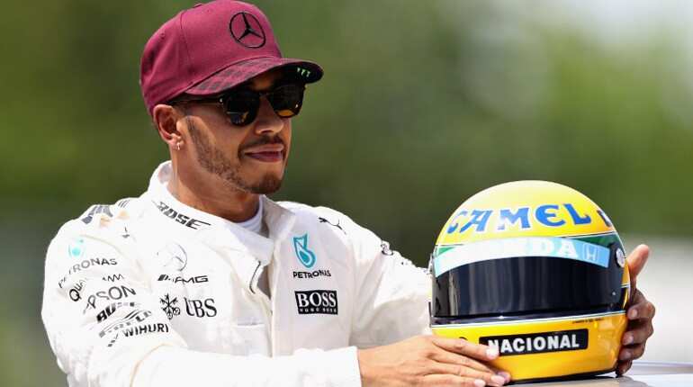 Ayrton Senna's iconic yellow helmet goes to 'speechless' Hamilton