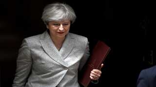May says minority government talks 'productive', Brexit negotiation starts next week
