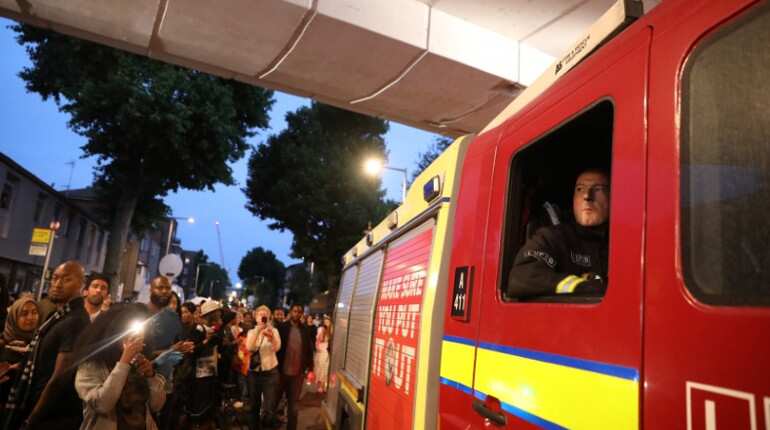 Firefighters stand tall